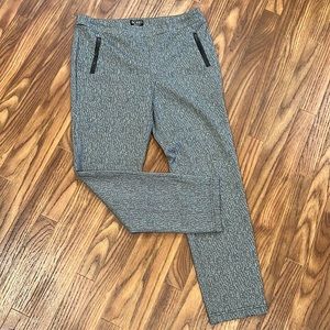 Smooth fit pull-on high-rise pants, tapered fit.